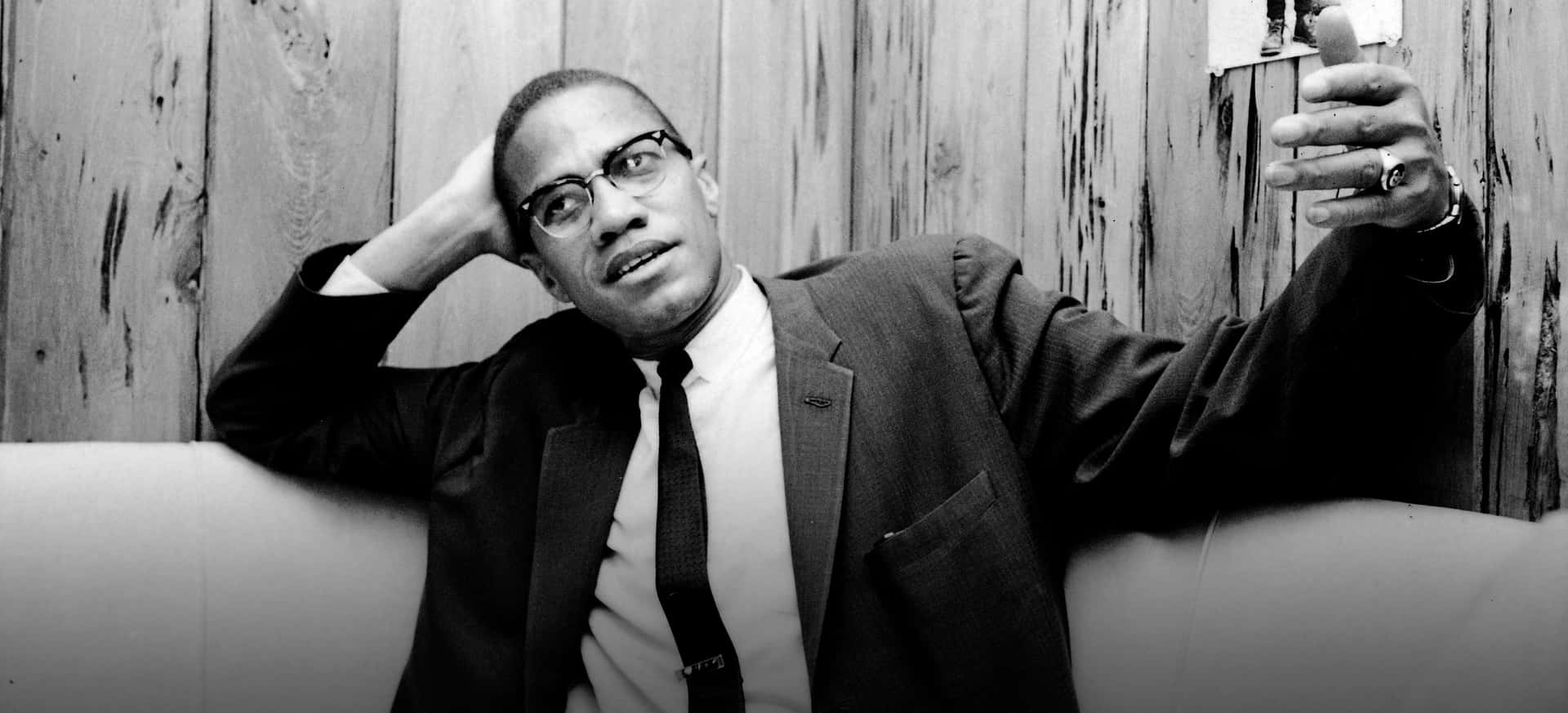 Malcolm X Contemplative Moment Wallpaper