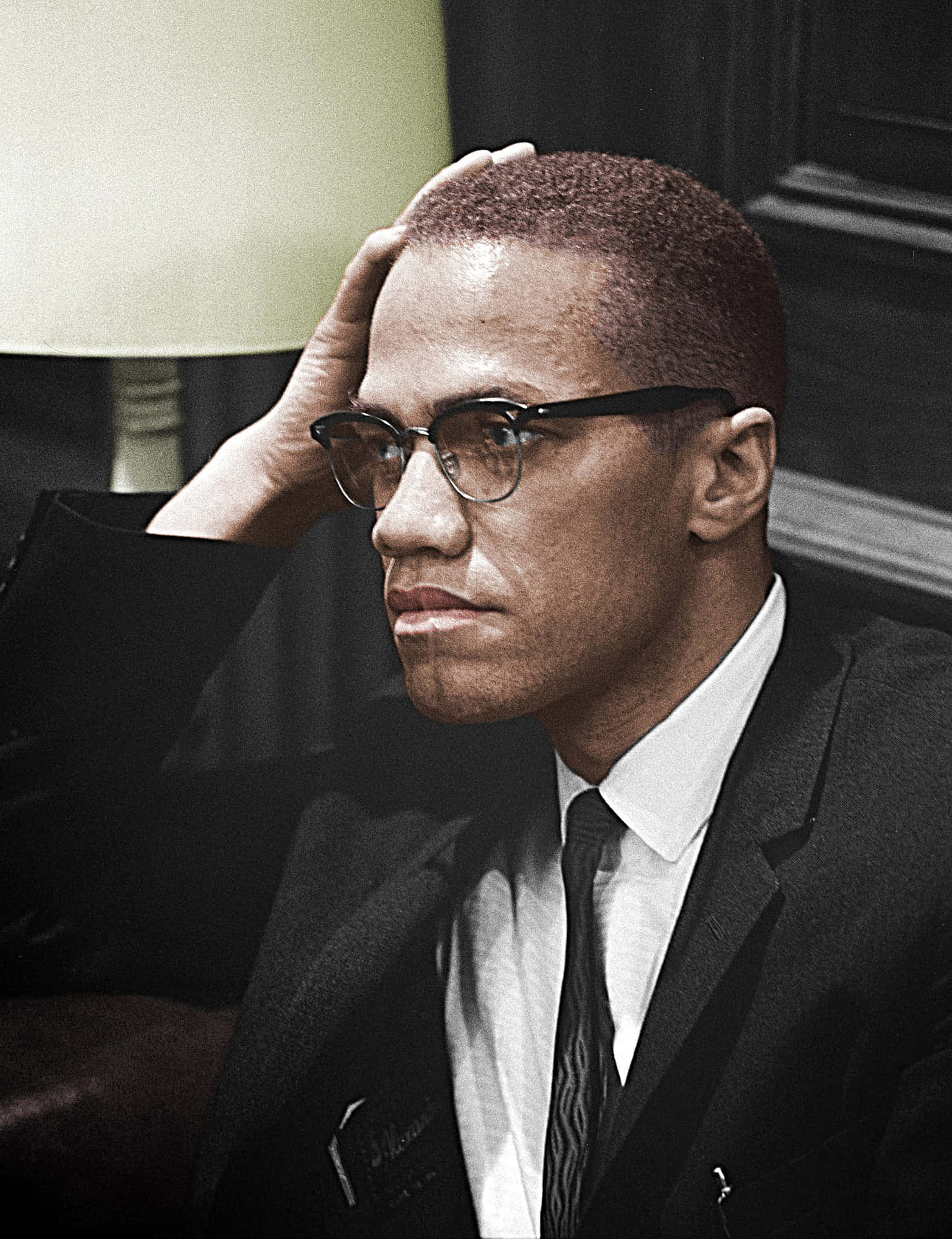 Malcolm X Contemplative Pose Wallpaper