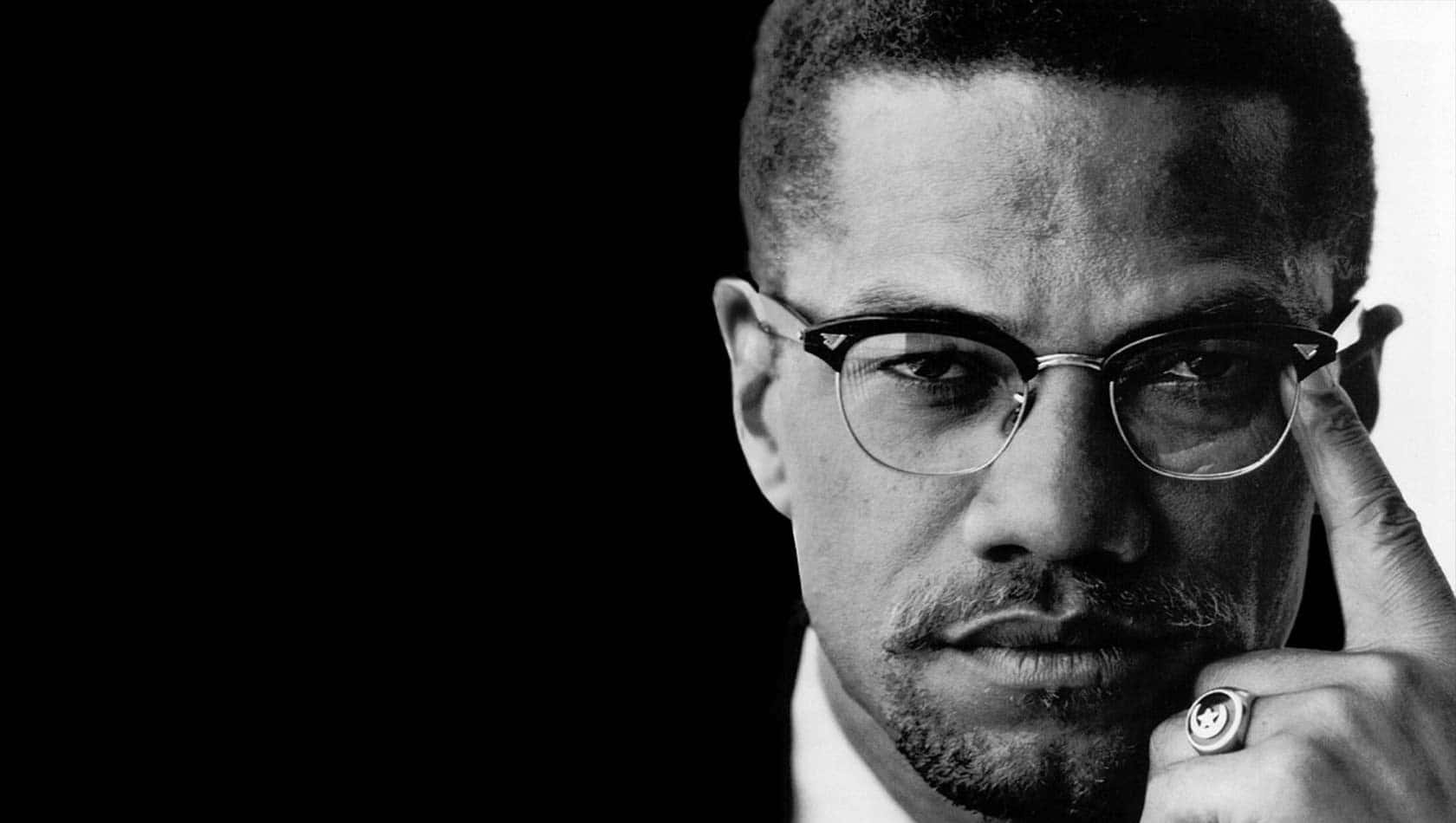 Malcolm X Intense Portrait Wallpaper