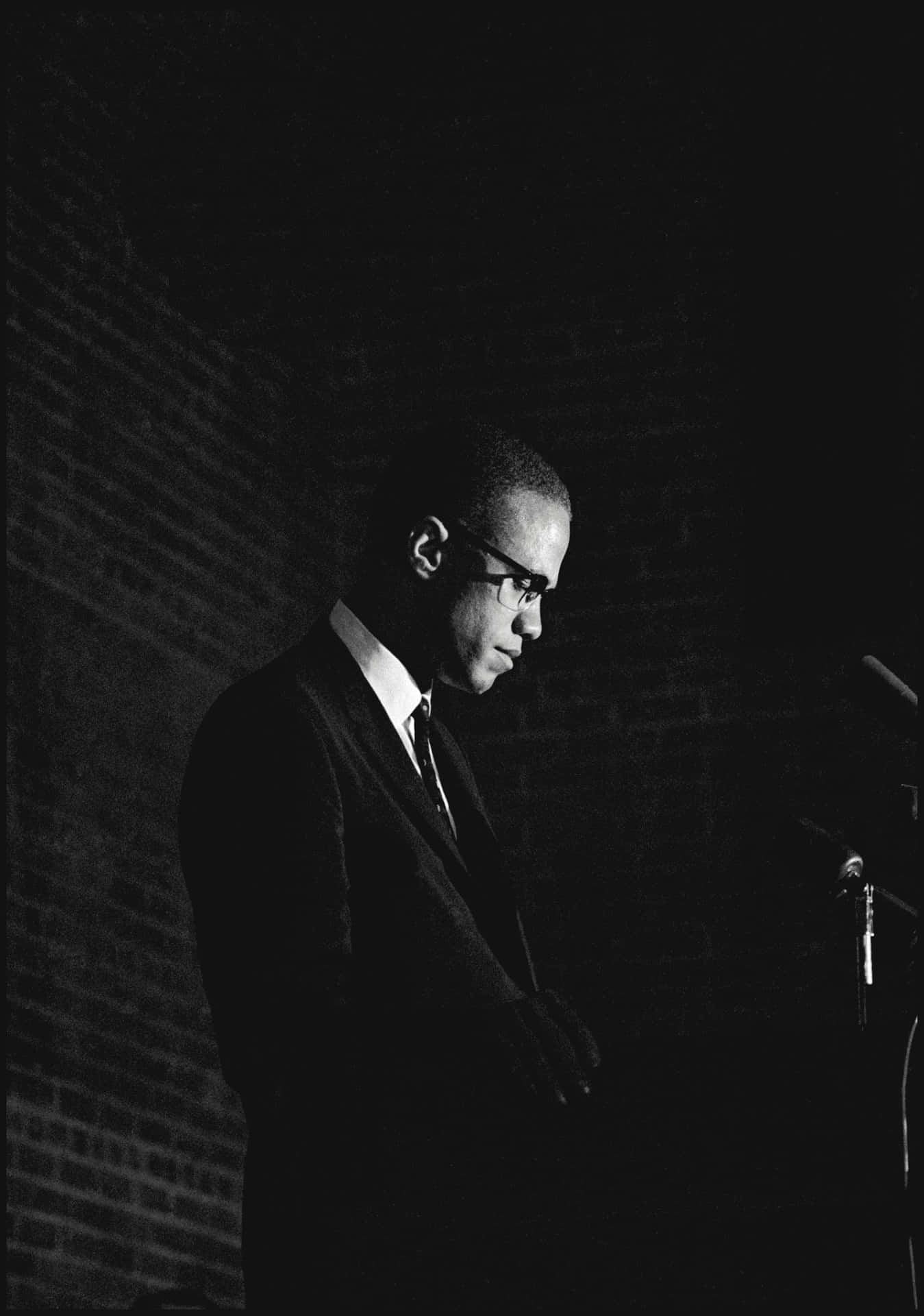 Malcolm X Speakingat Podium Wallpaper