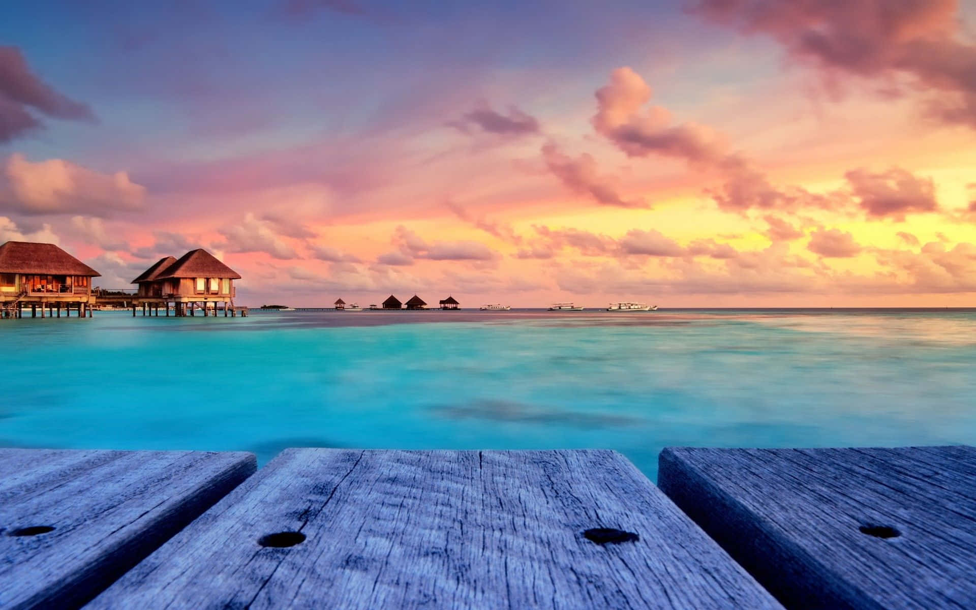 Serene Maldives Beach at Sunset Wallpaper