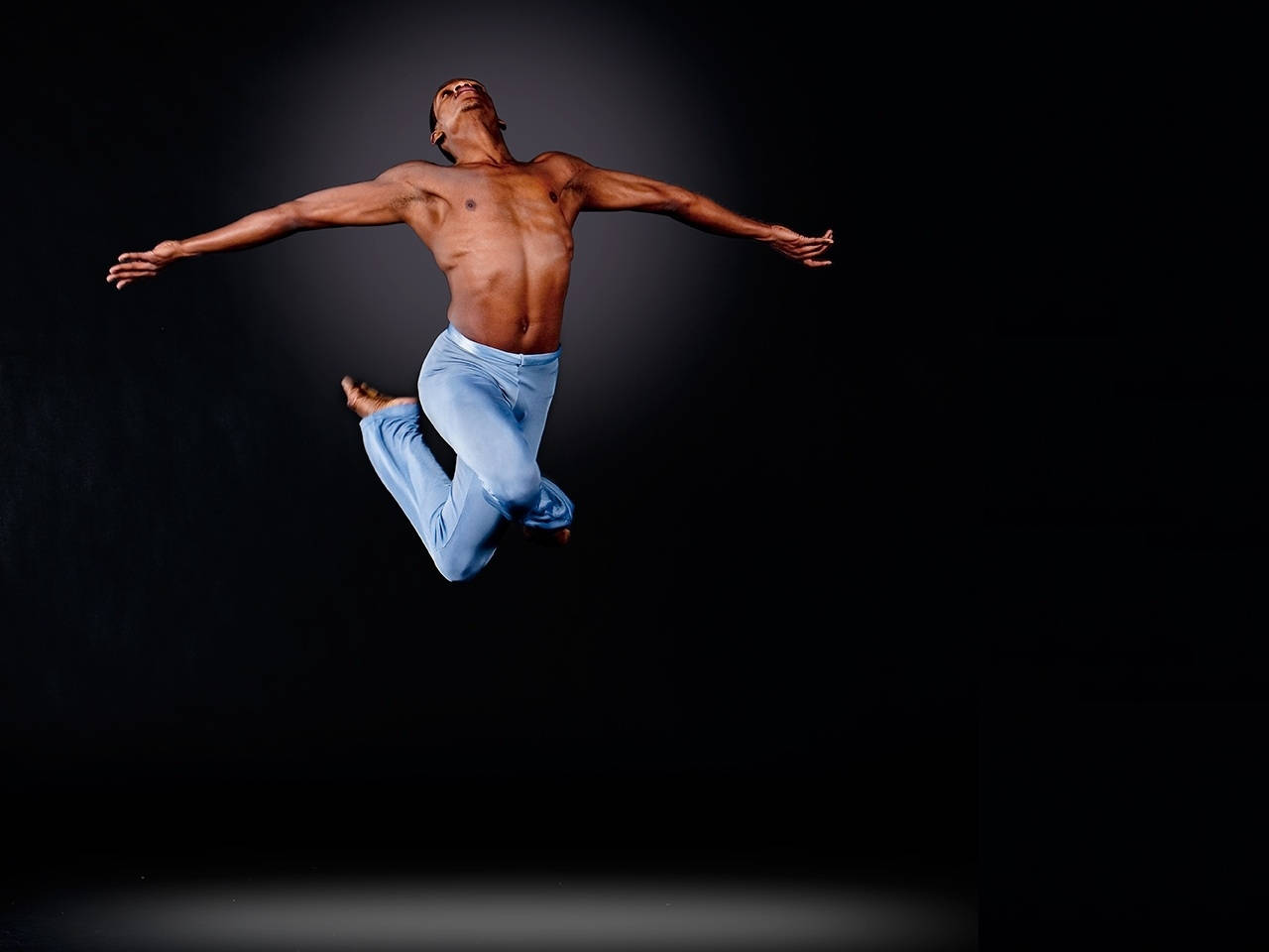 Male Dancer Mid-air Dance Pose Wallpaper