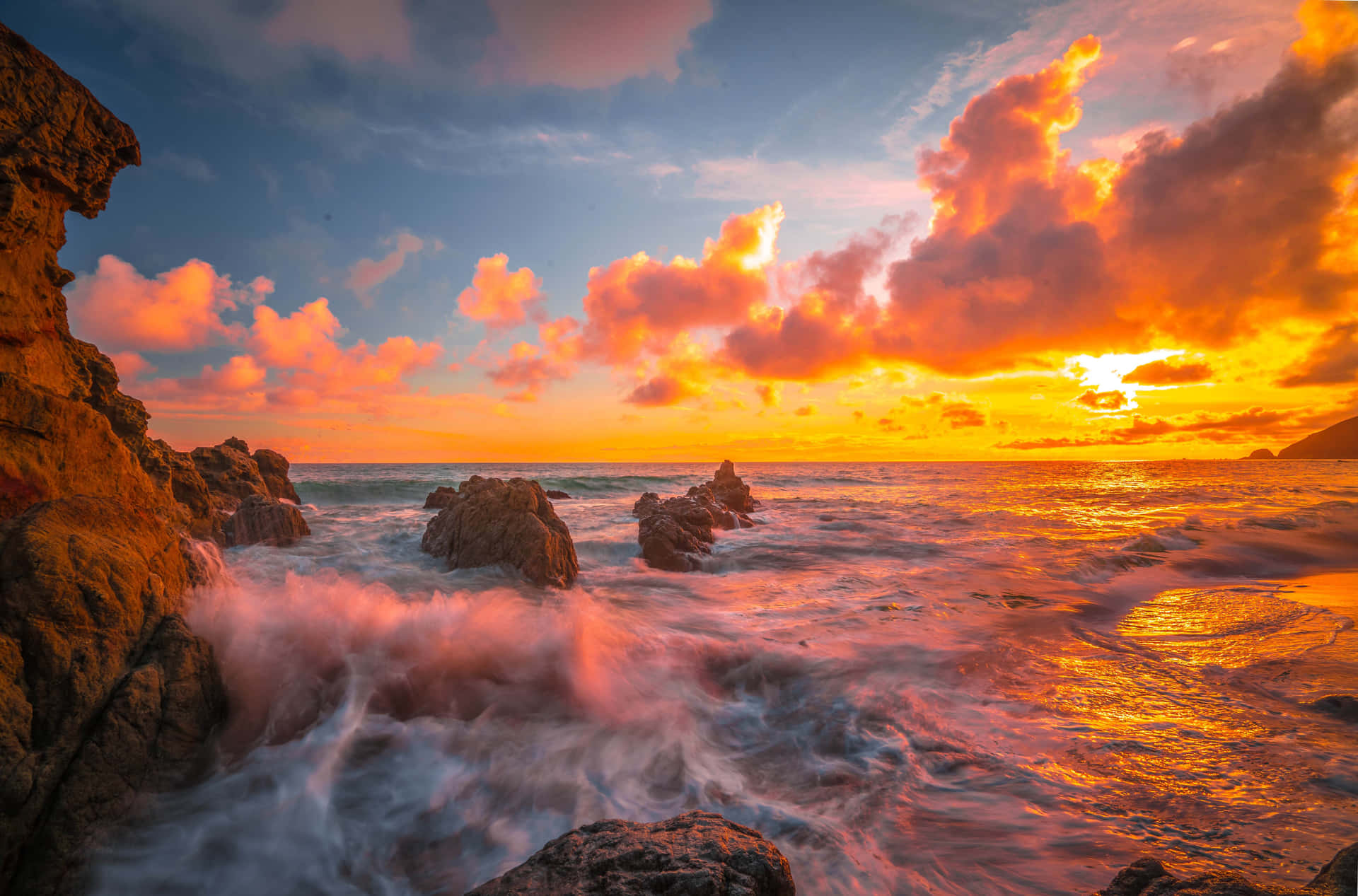A Romantic Malibu Beach Sunrise Wallpaper