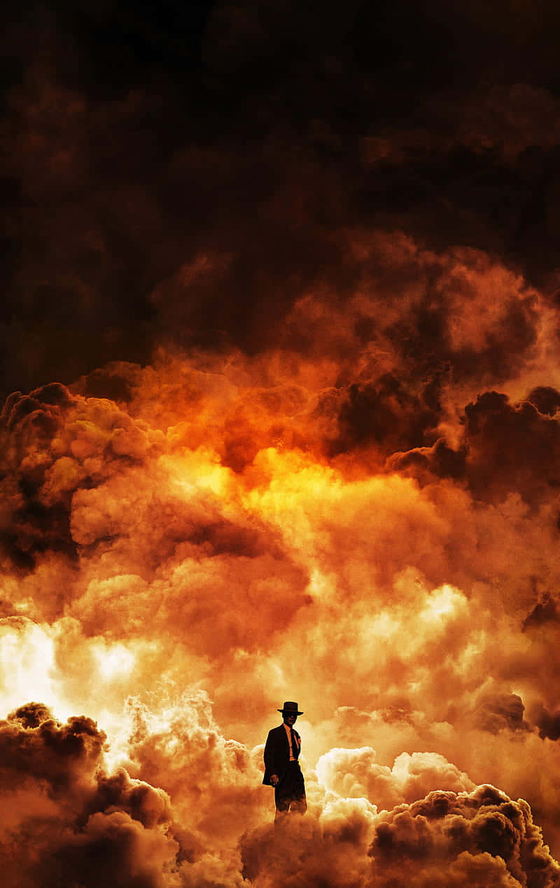 Man Amidst Fiery Clouds Wallpaper