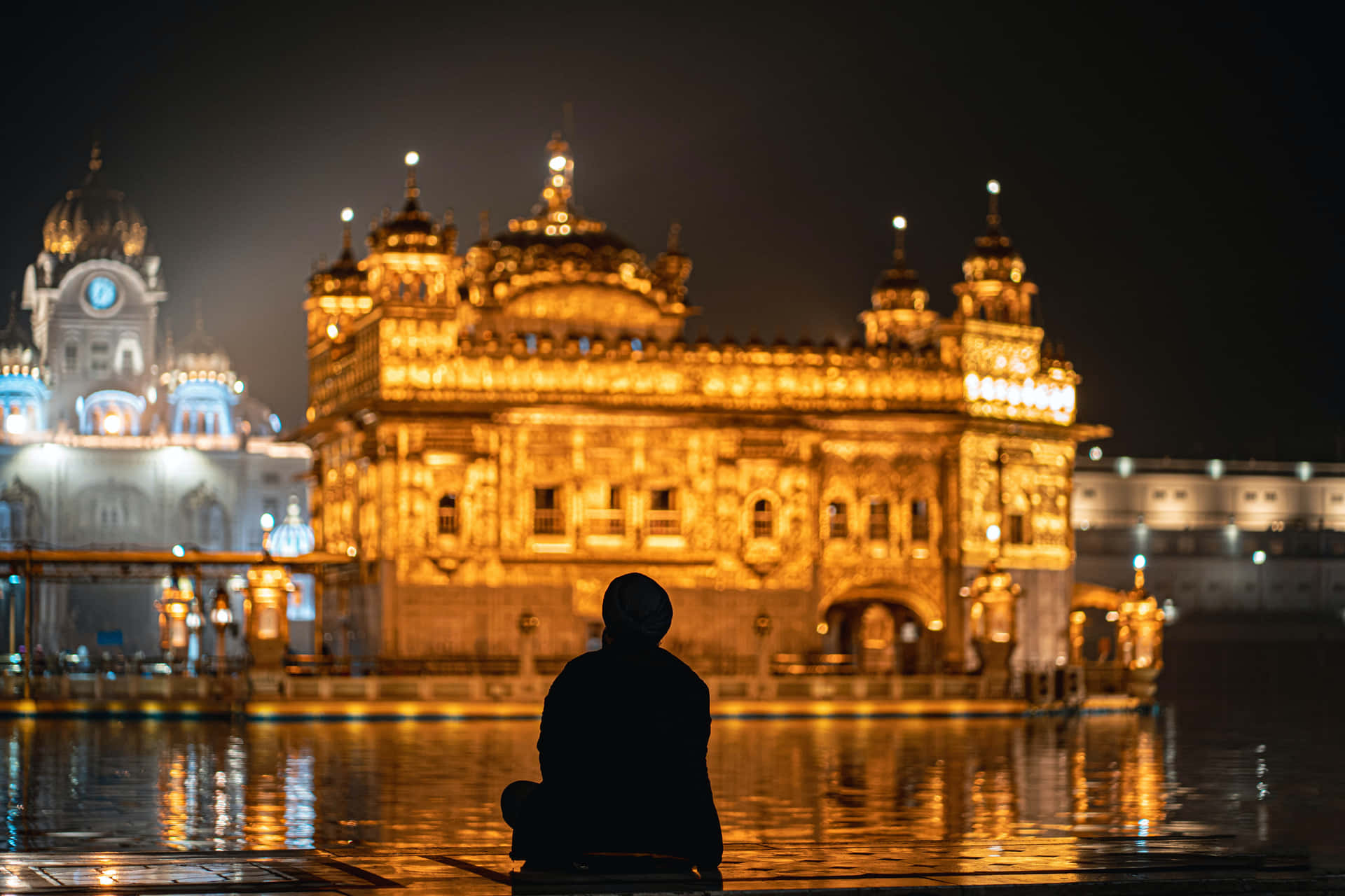 Download Man And Golden Temple Wallpaper 