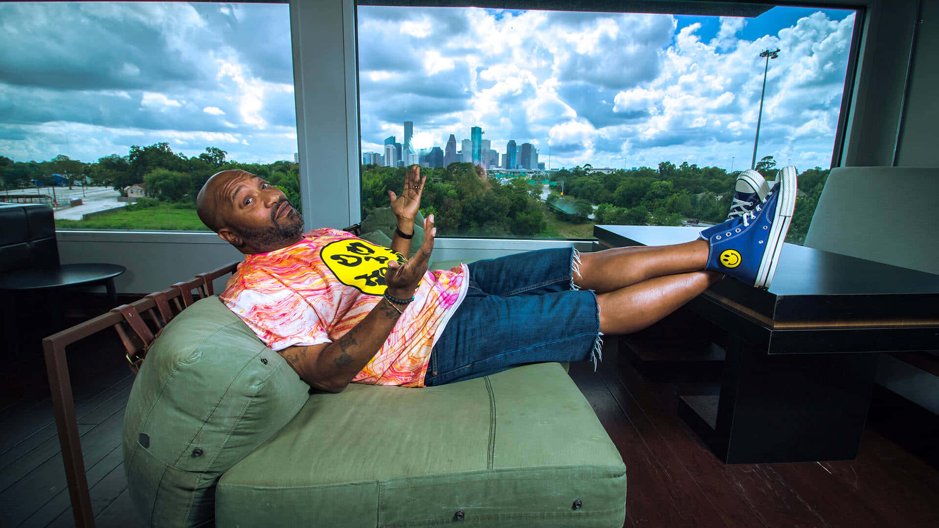 Man Chilling With City View Wallpaper