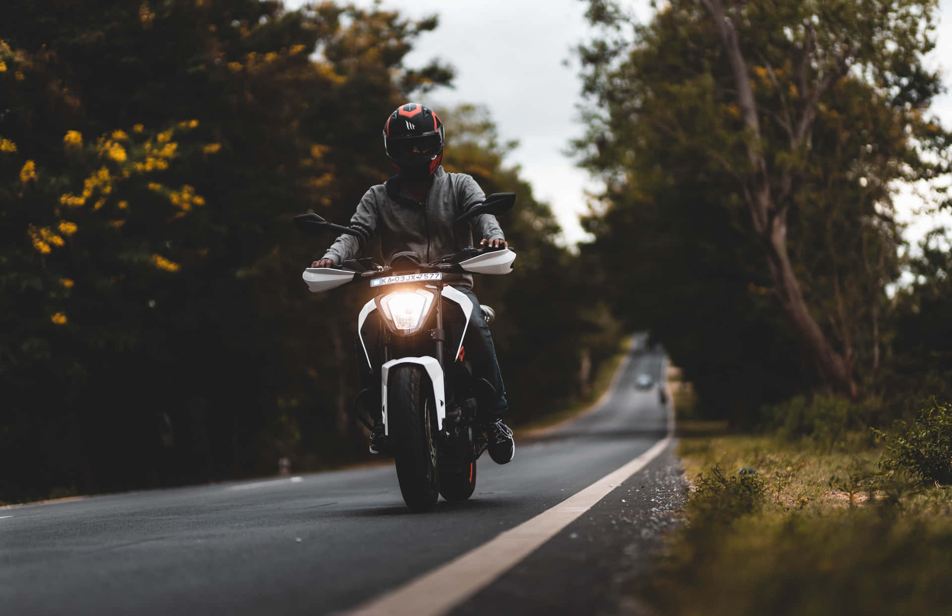 Man Driving Motorcycle [wallpaper] Wallpaper