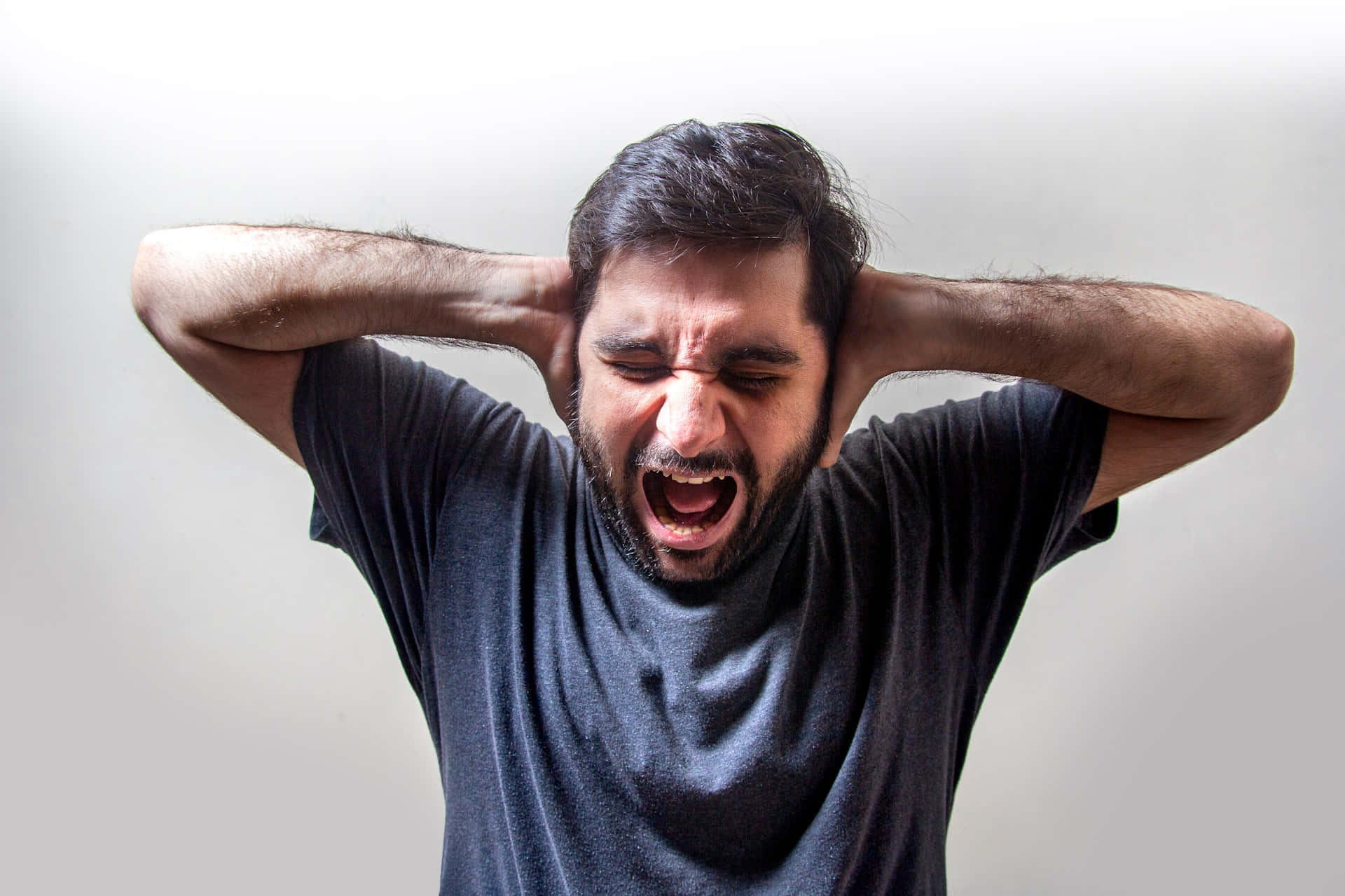 Man Experiencing Headacheor Stress Wallpaper