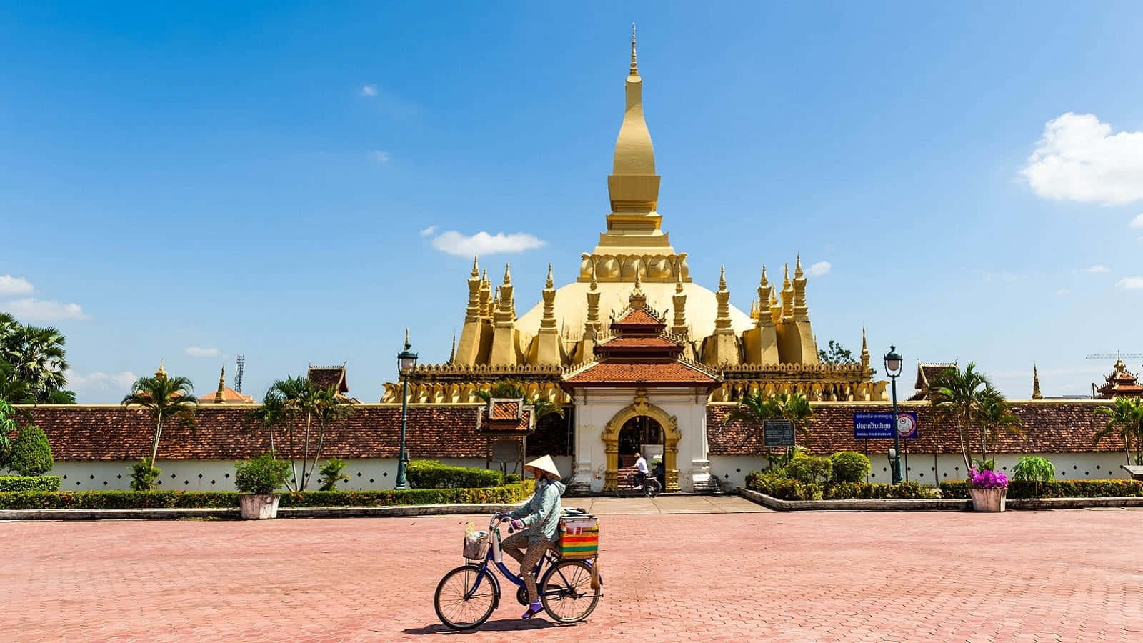 Man In Bike In Vientiane Wallpaper