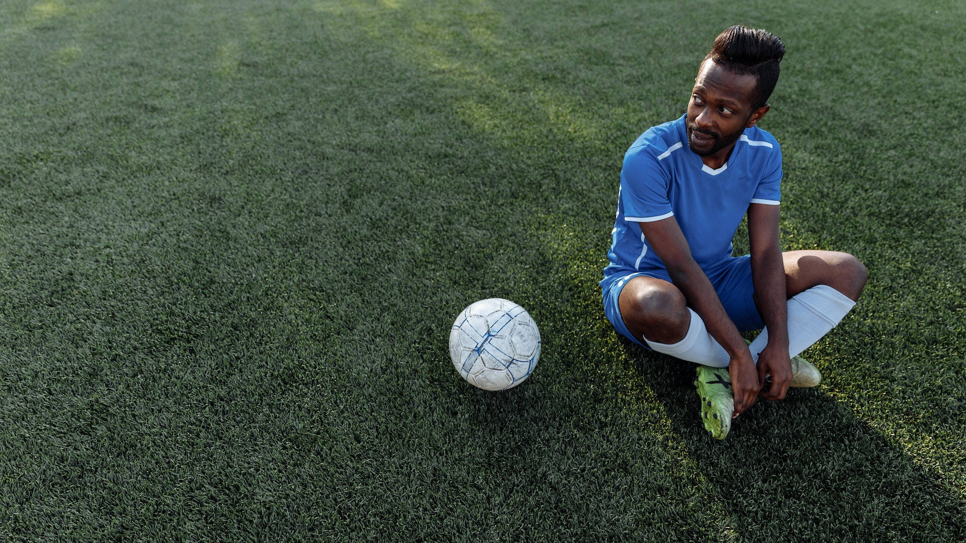 Man In Blue With Football Hd Picture