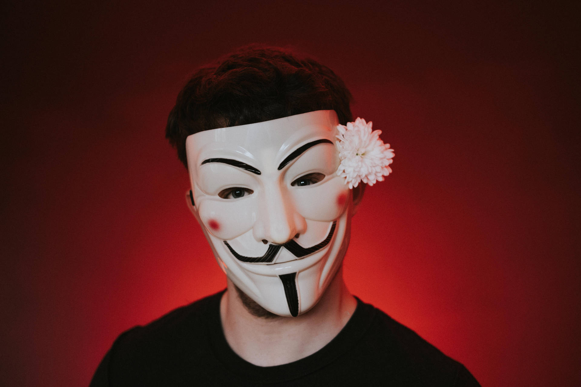 Man In Hacker Mask With Flower