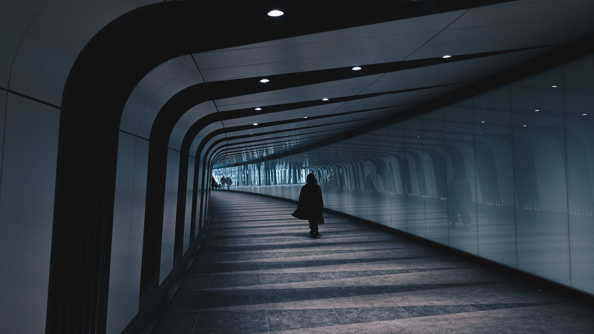Man In Massive Underground Tunnel Wallpaper