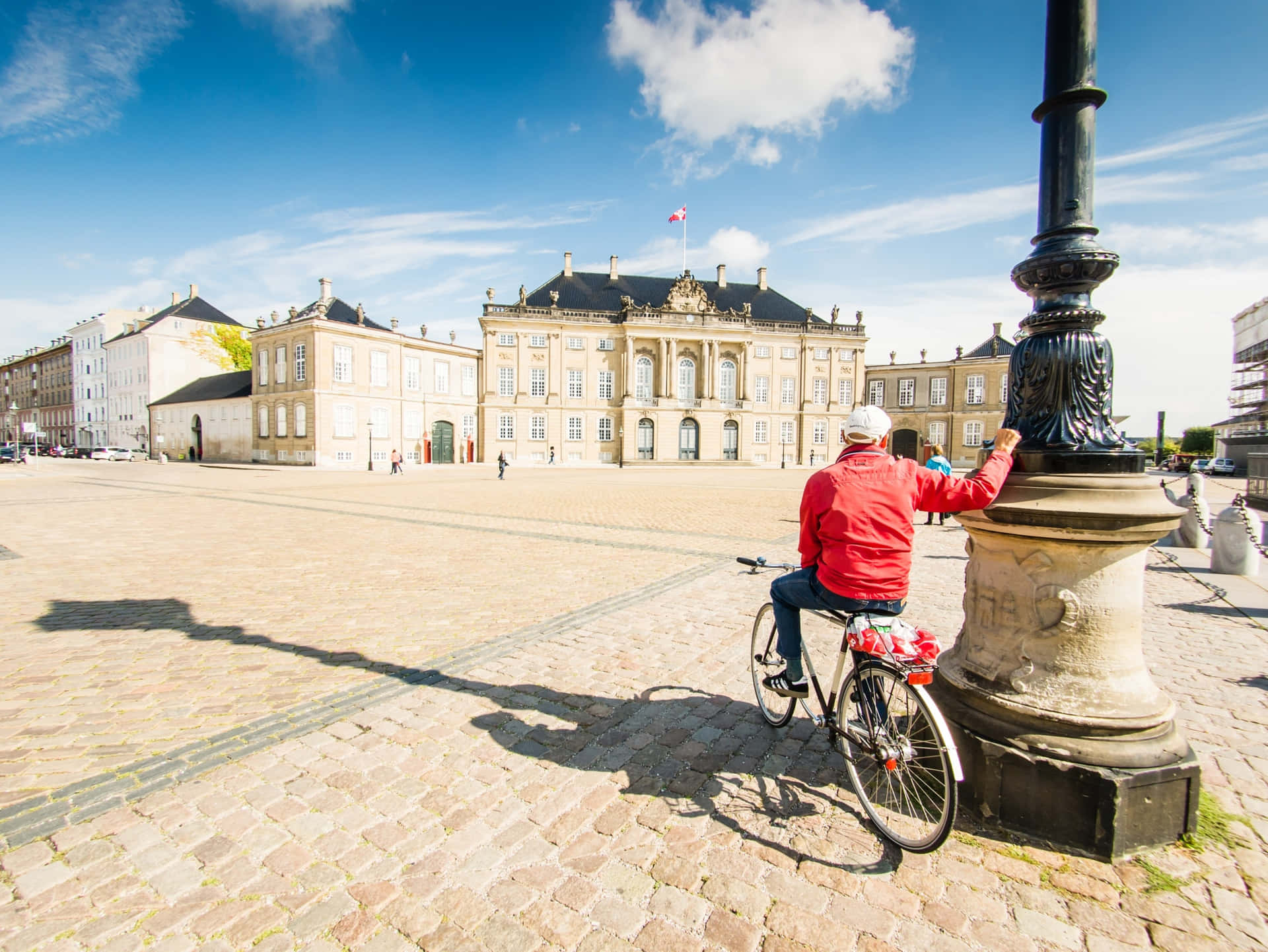 Man In Red In Amalienborg Palace Wallpaper