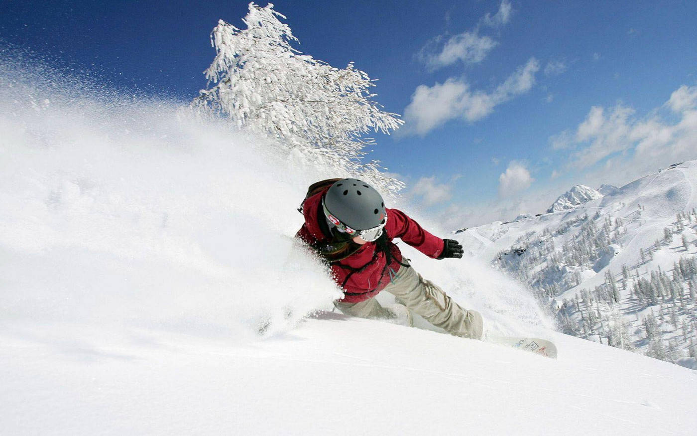 Man In Red With Snowboard Dashing Through Snow Background