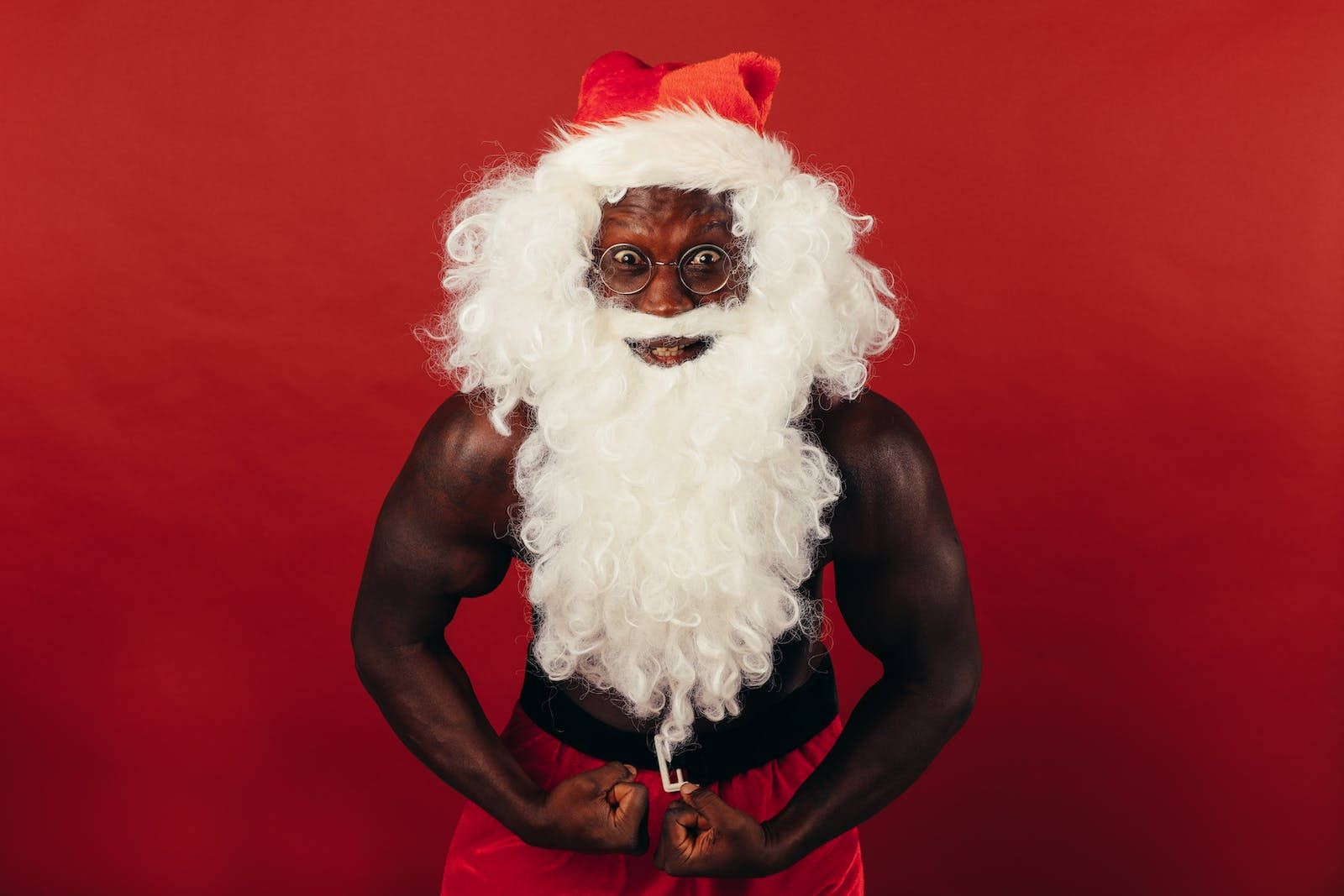 Man In Santa Outfit Funny Christmas Wallpaper