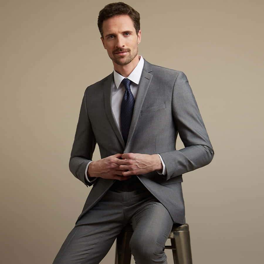 A Man in a Groomed Tailored Suit