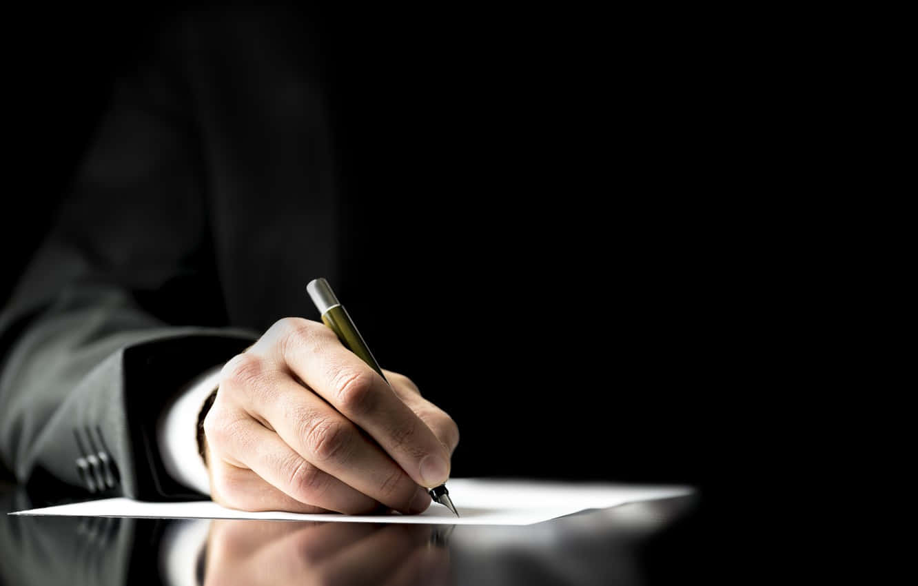 Caption: Businessman Signing a Contract Wallpaper