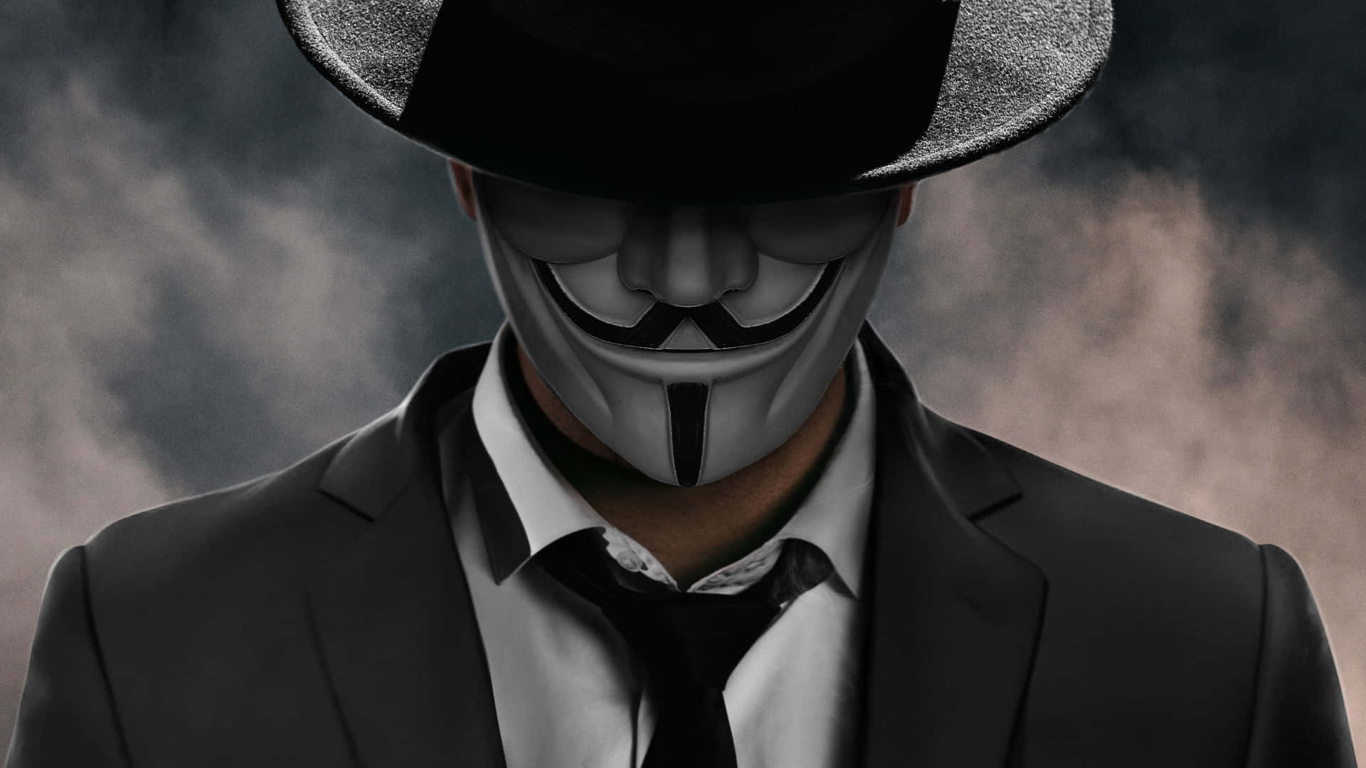 Man In Suit With Joker Face Wallpaper
