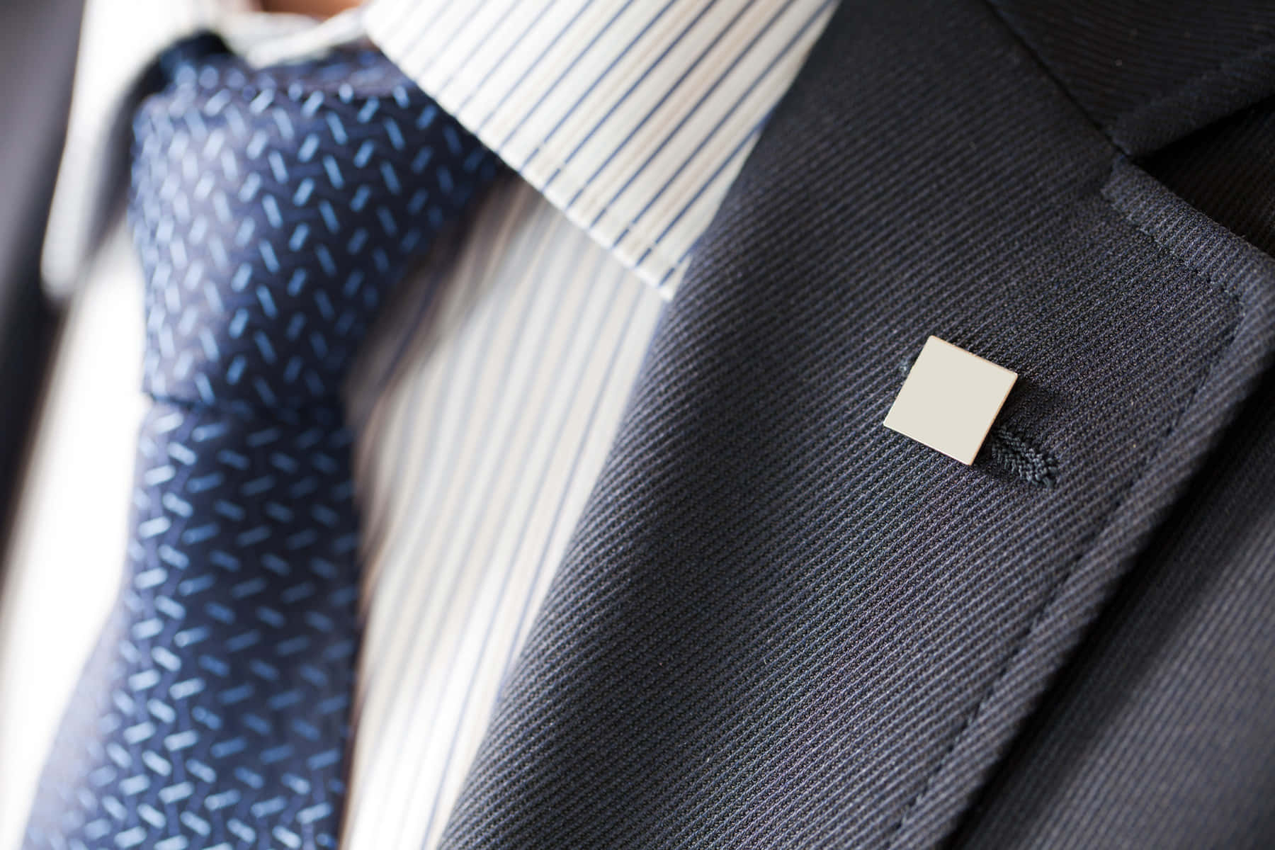 Man In Suit With Square Pin Wallpaper