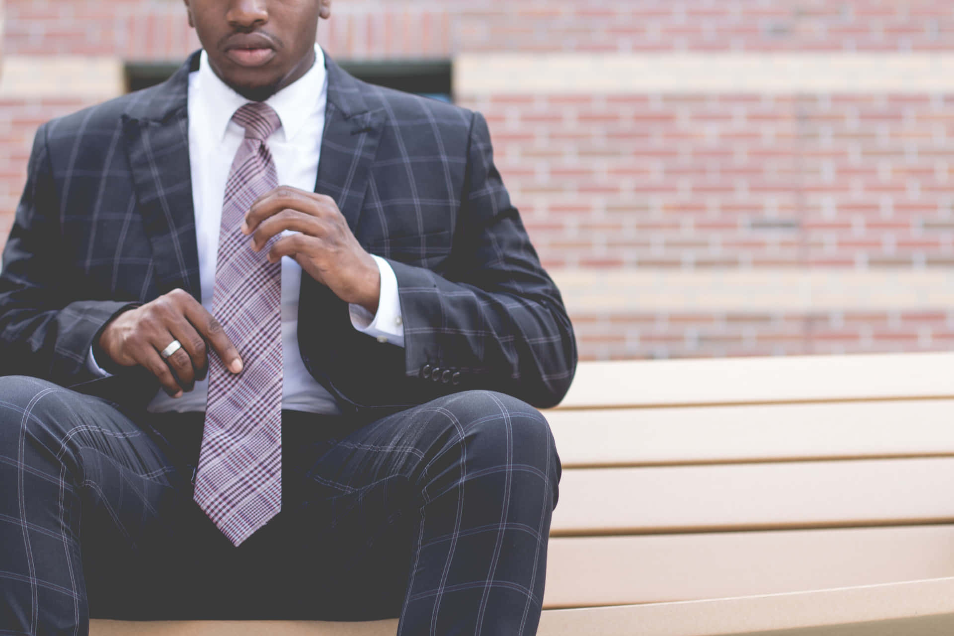 Man In Suit With Striped Necktie Wallpaper