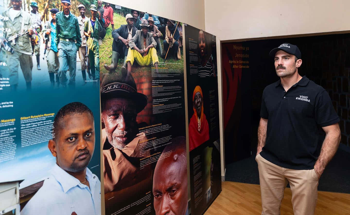 Man Looking At Kigali Genocide Memorial Survivors Wallpaper