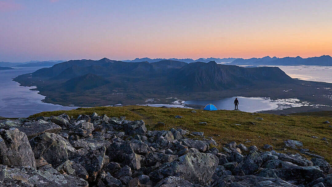 Man Overlooking Hd Mountain Fjord Wallpaper