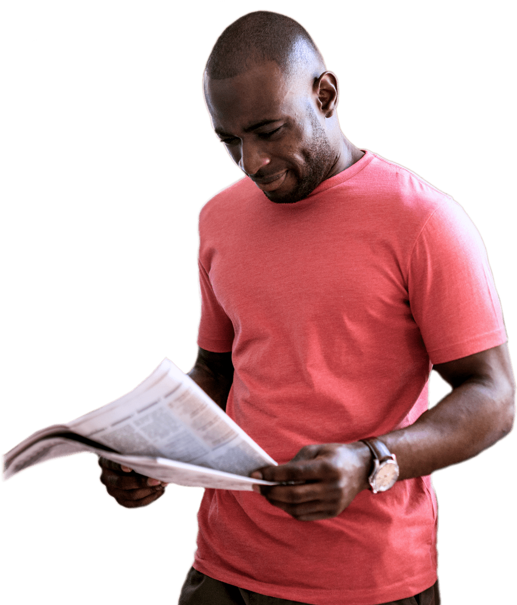 Download Man Reading Newspaper | Wallpapers.com