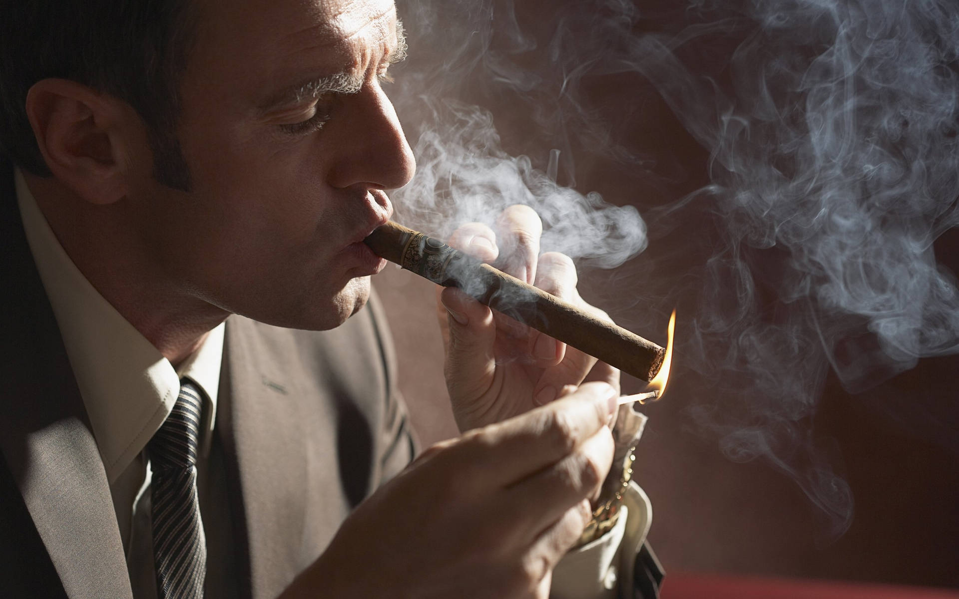 Man Smoking Cigarette With Tuxedo