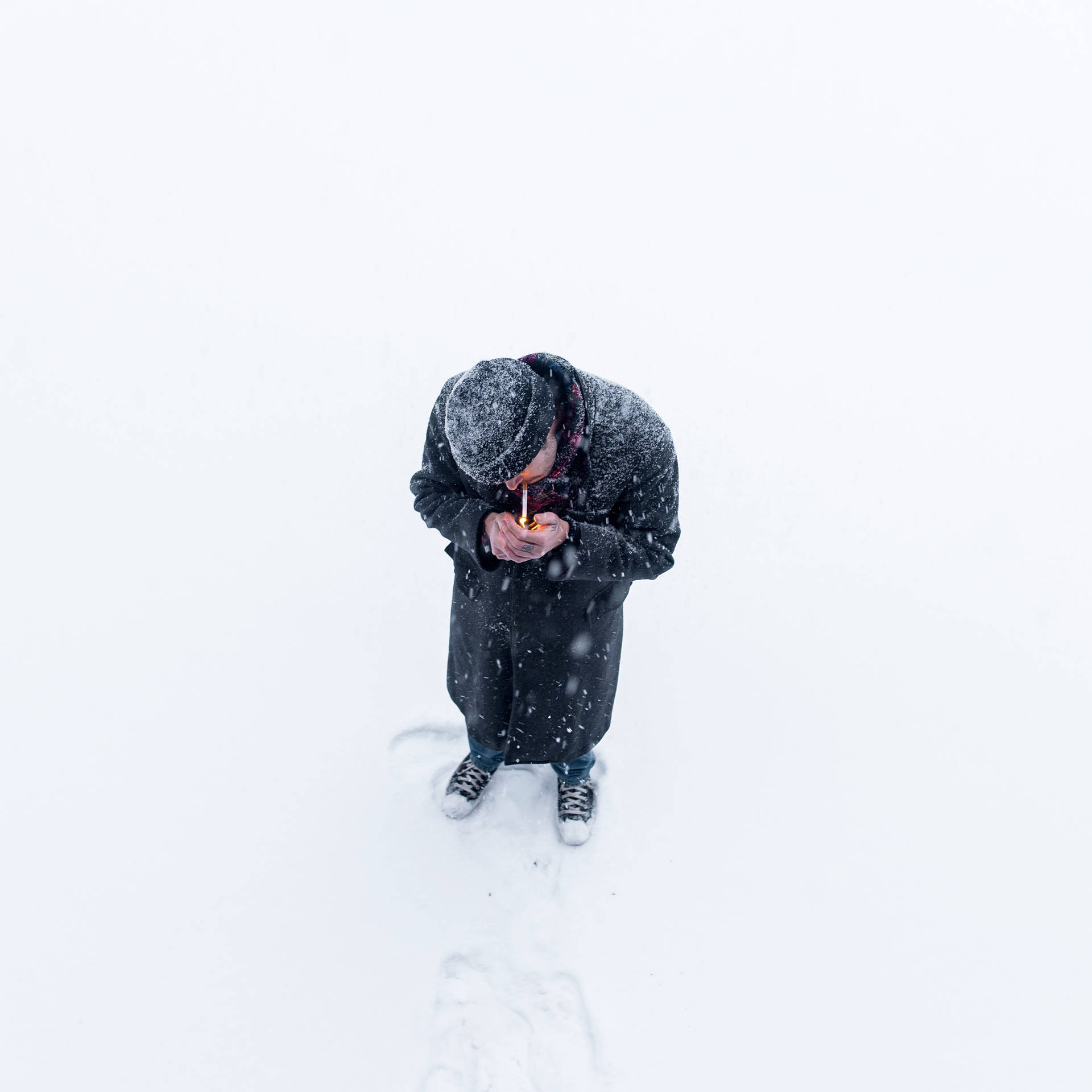 Man Smoking In Snow Wallpaper
