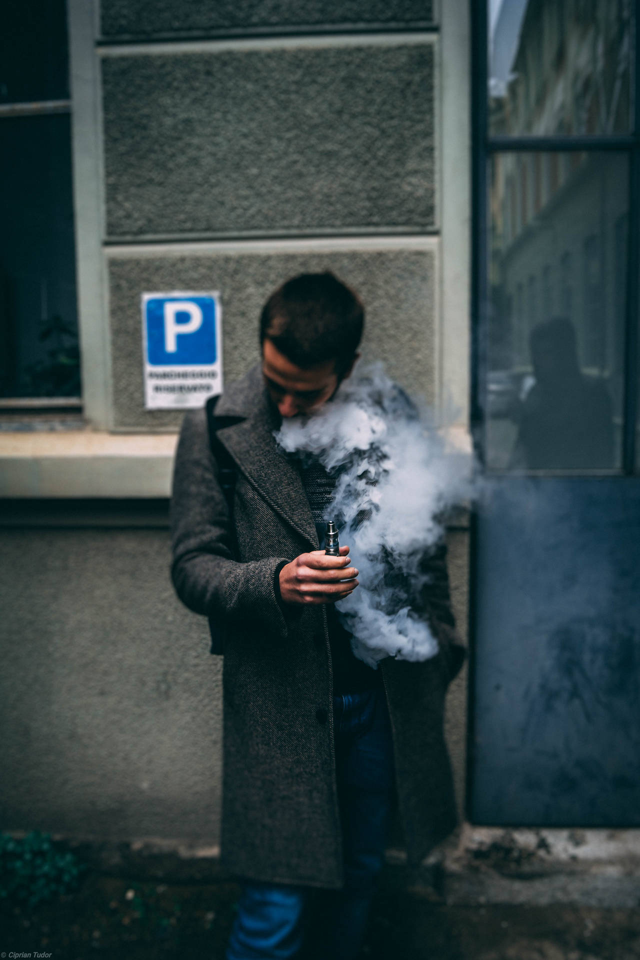 Man Smoking Vape Wallpaper