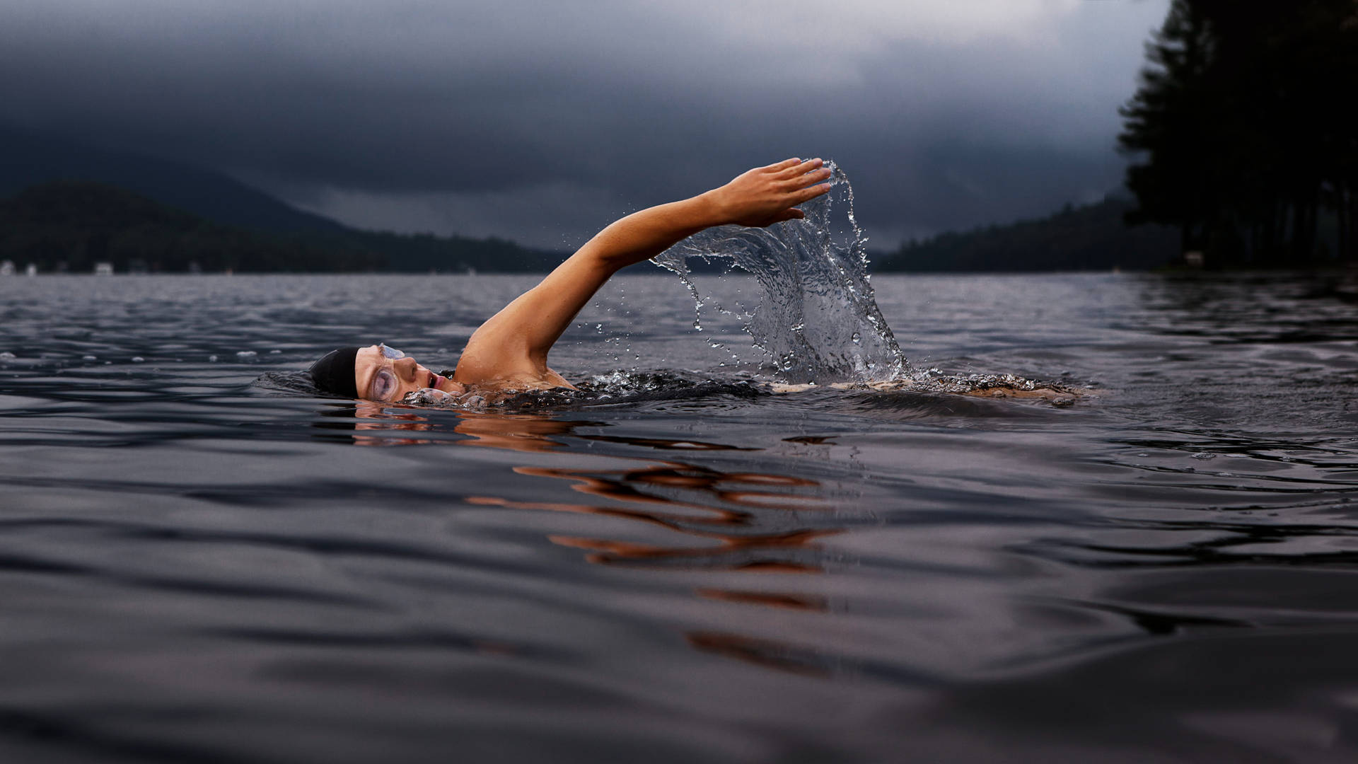 Man Swimming In Lake Wallpaper