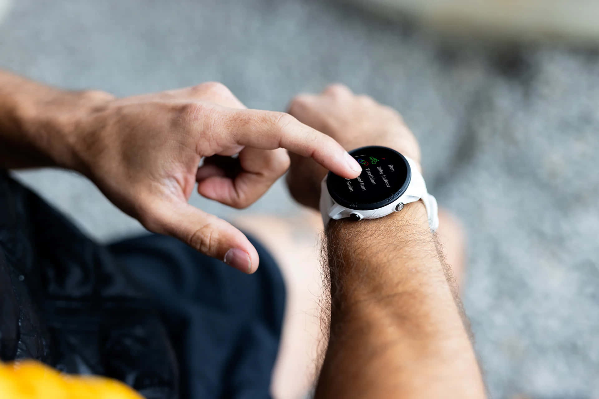 Man Using Smartwatch Fitness App Wallpaper