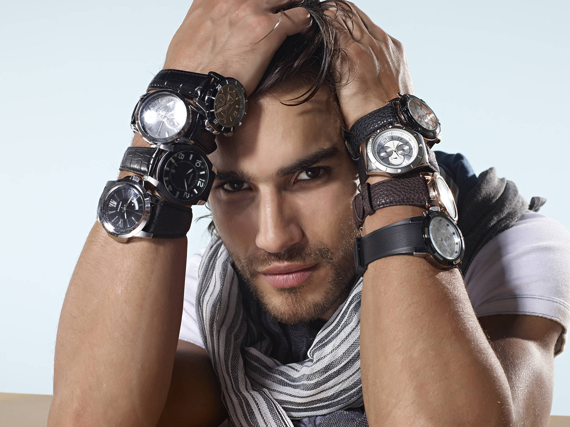 Man Wearing Lots Of Watches