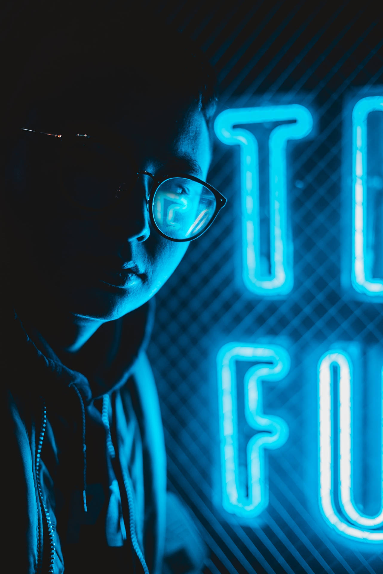 Man With Eyeglasses In Neon Blue Iphone Wallpaper