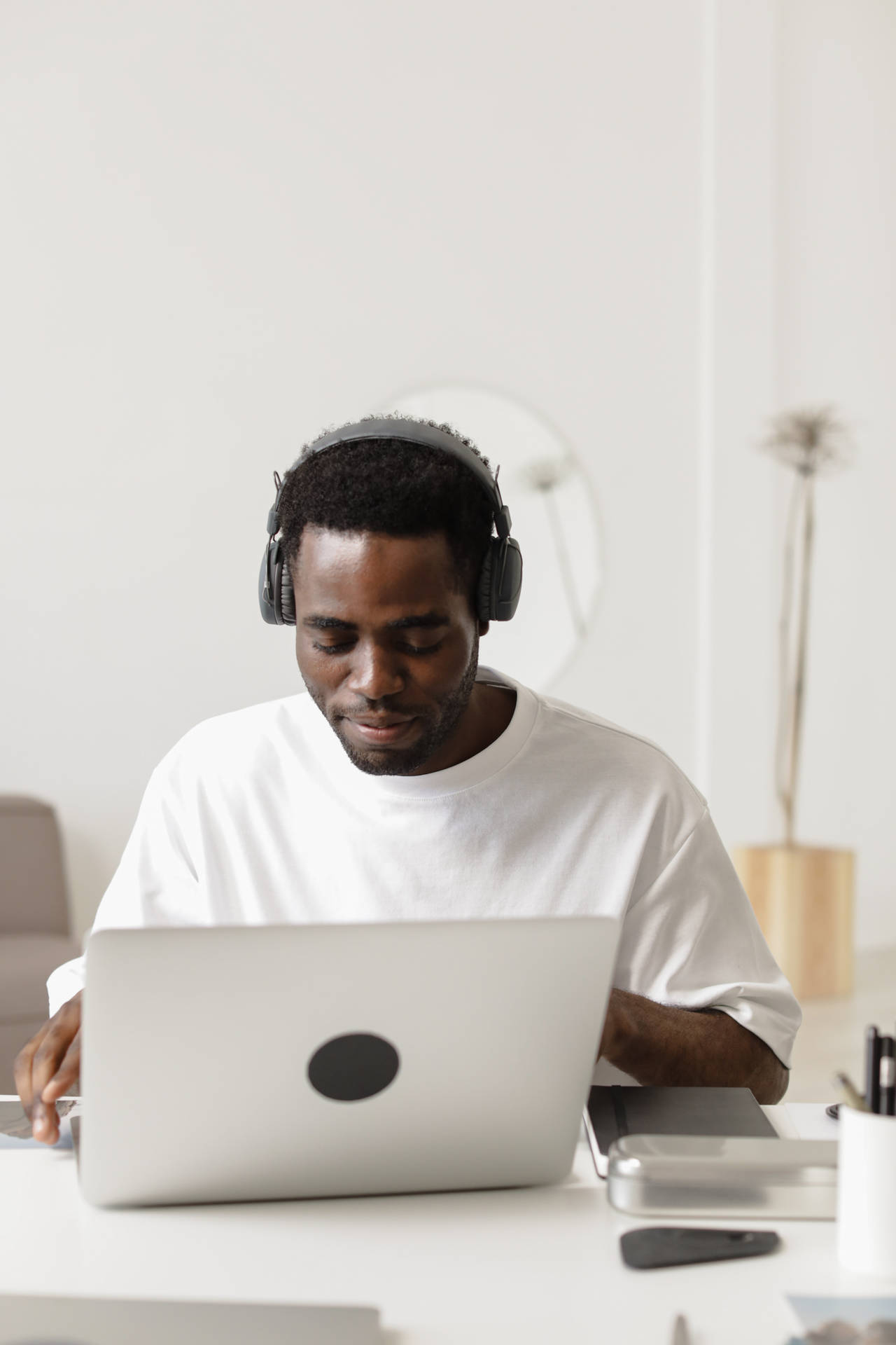 Man With Headphones Creating Content Background