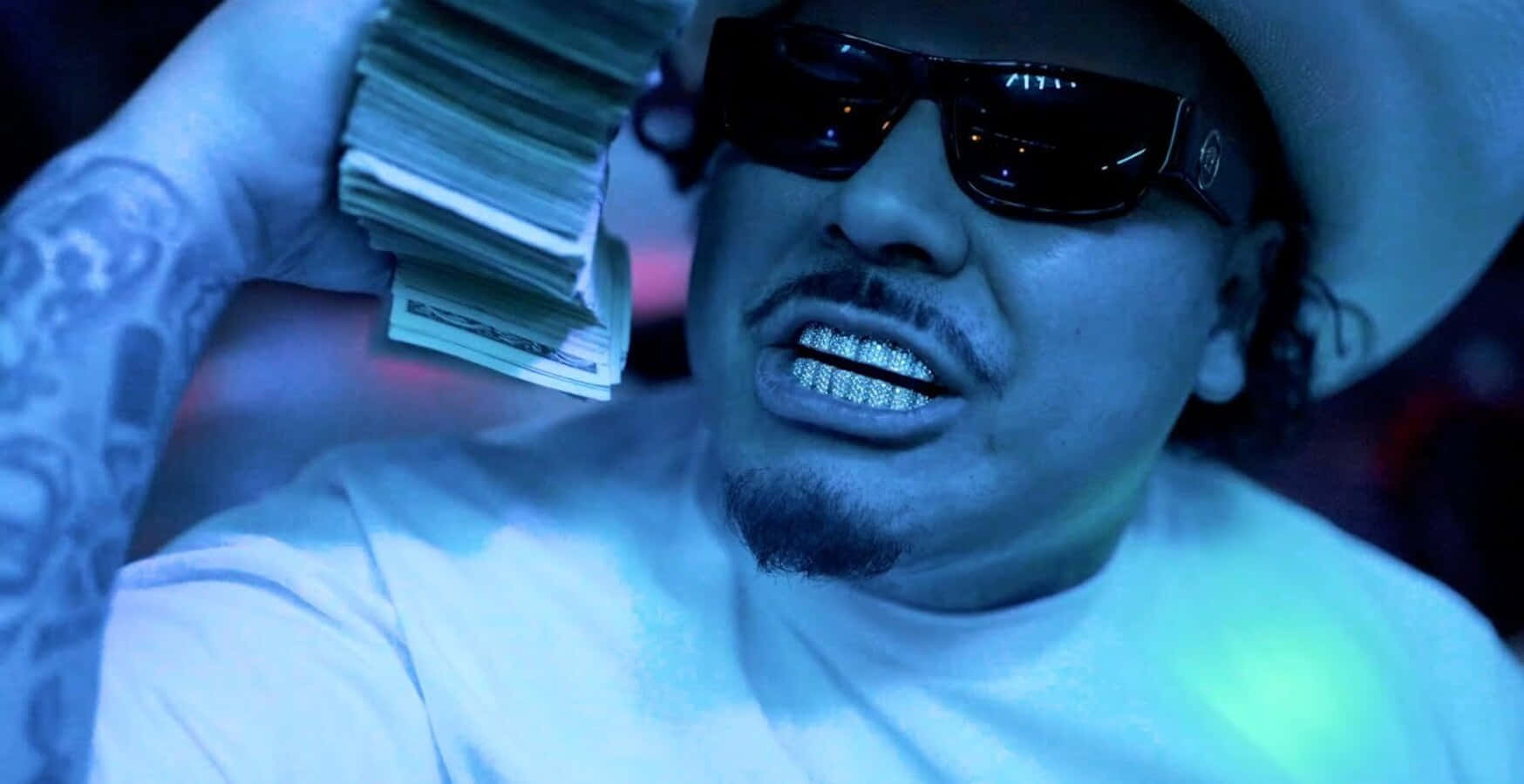 Man_with_ Money_and_ Grillz Wallpaper