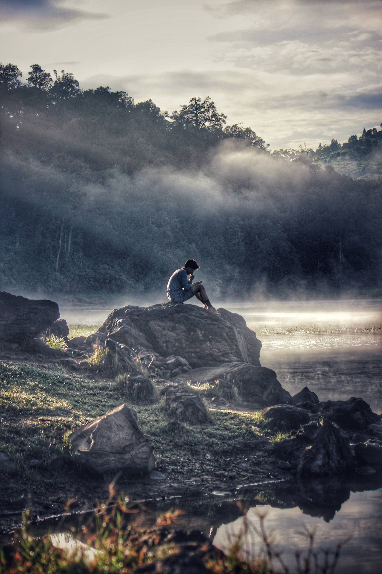 Man With Phone Sitting Alone Background