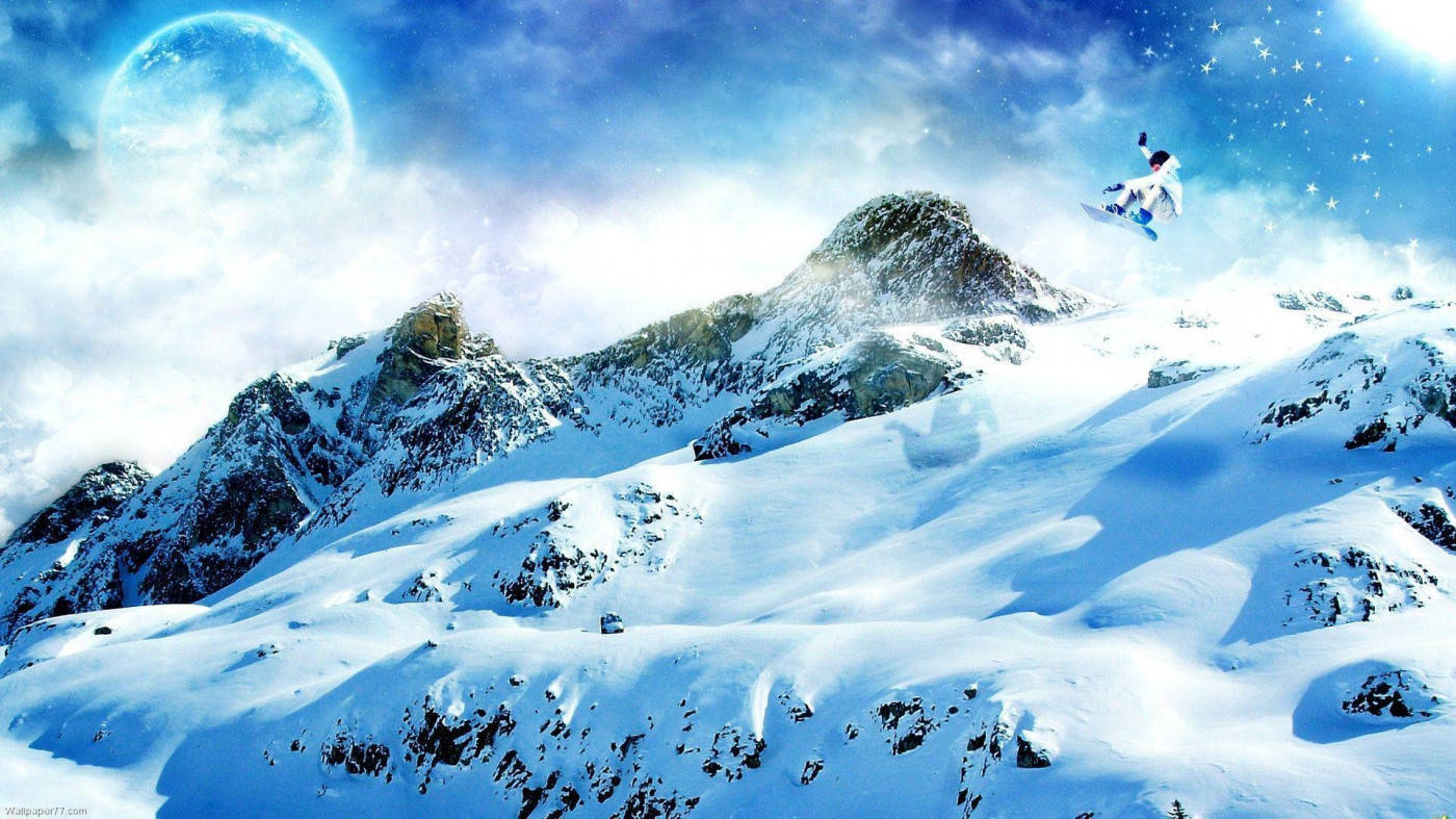 Man With Snowboard Leaping Over Snowy Mountains Wallpaper