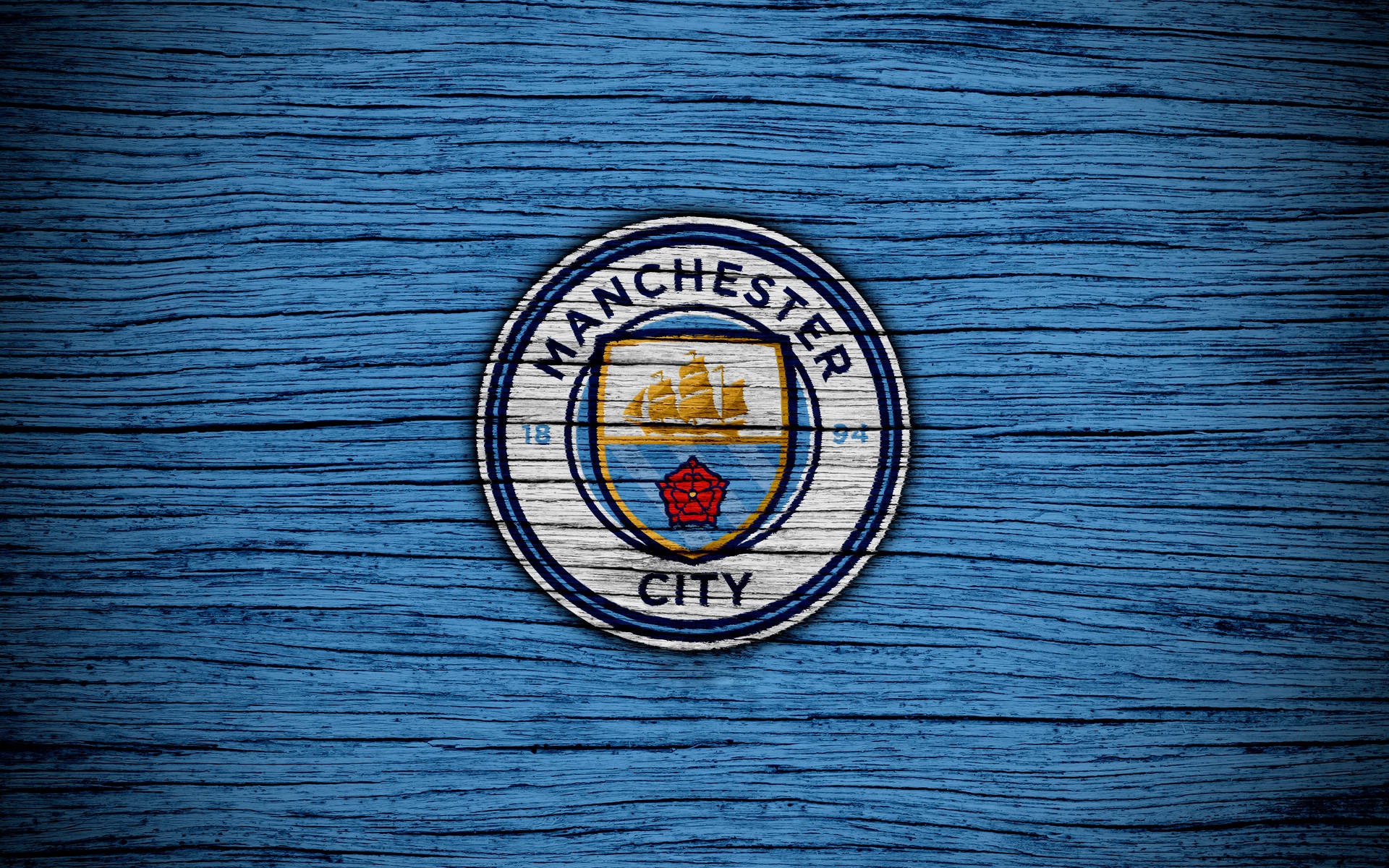 Manchester City 4k Brushed Blue Badge Background