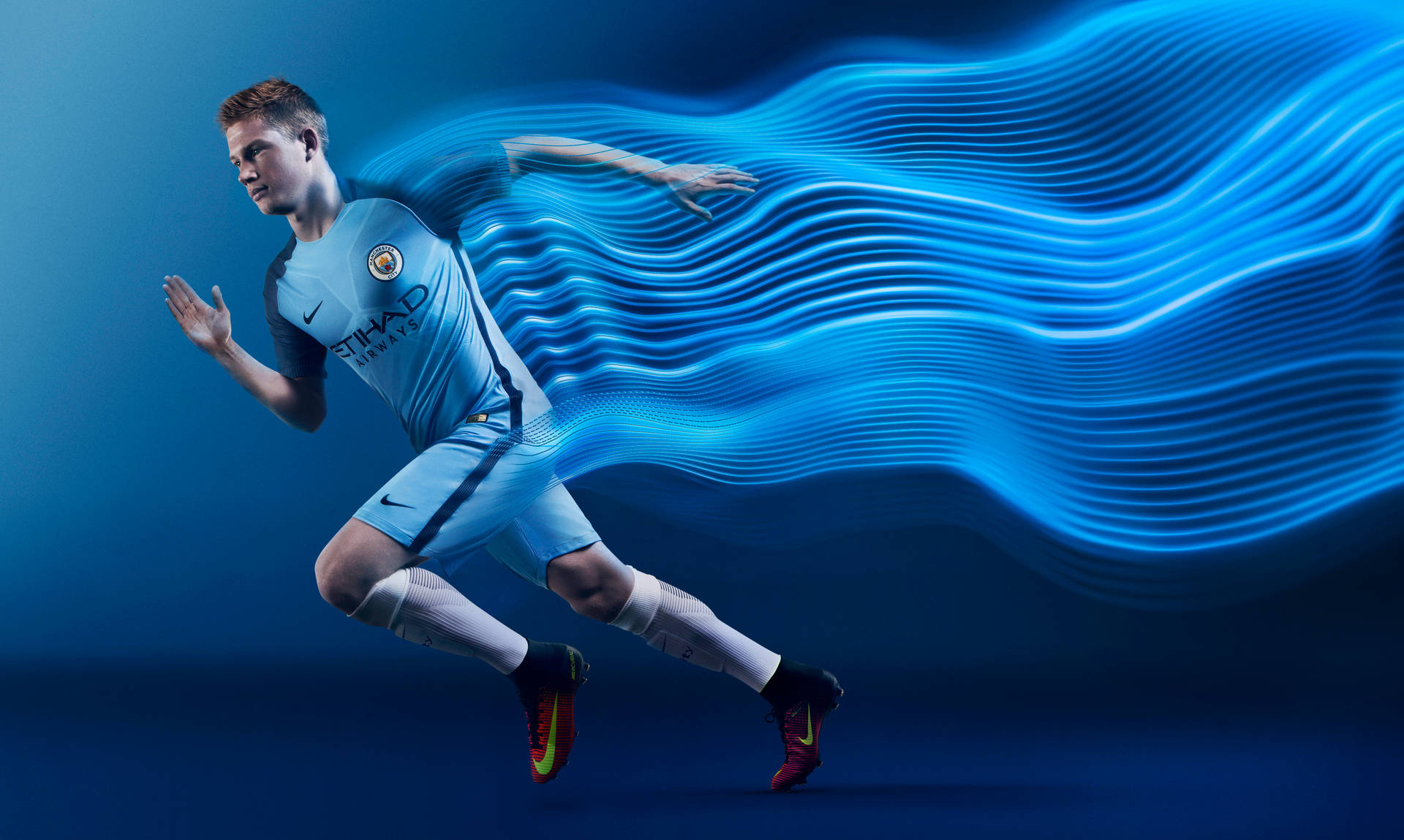 Manchester City 4k Løbende Fodboldspiller Wallpaper