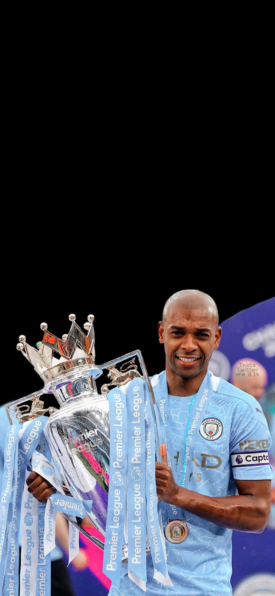Manchester City Holding Trophy Iphone Wallpaper