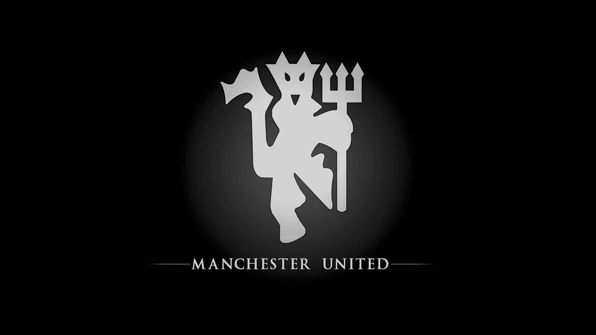 Manchester United-logo Med Løve Wallpaper