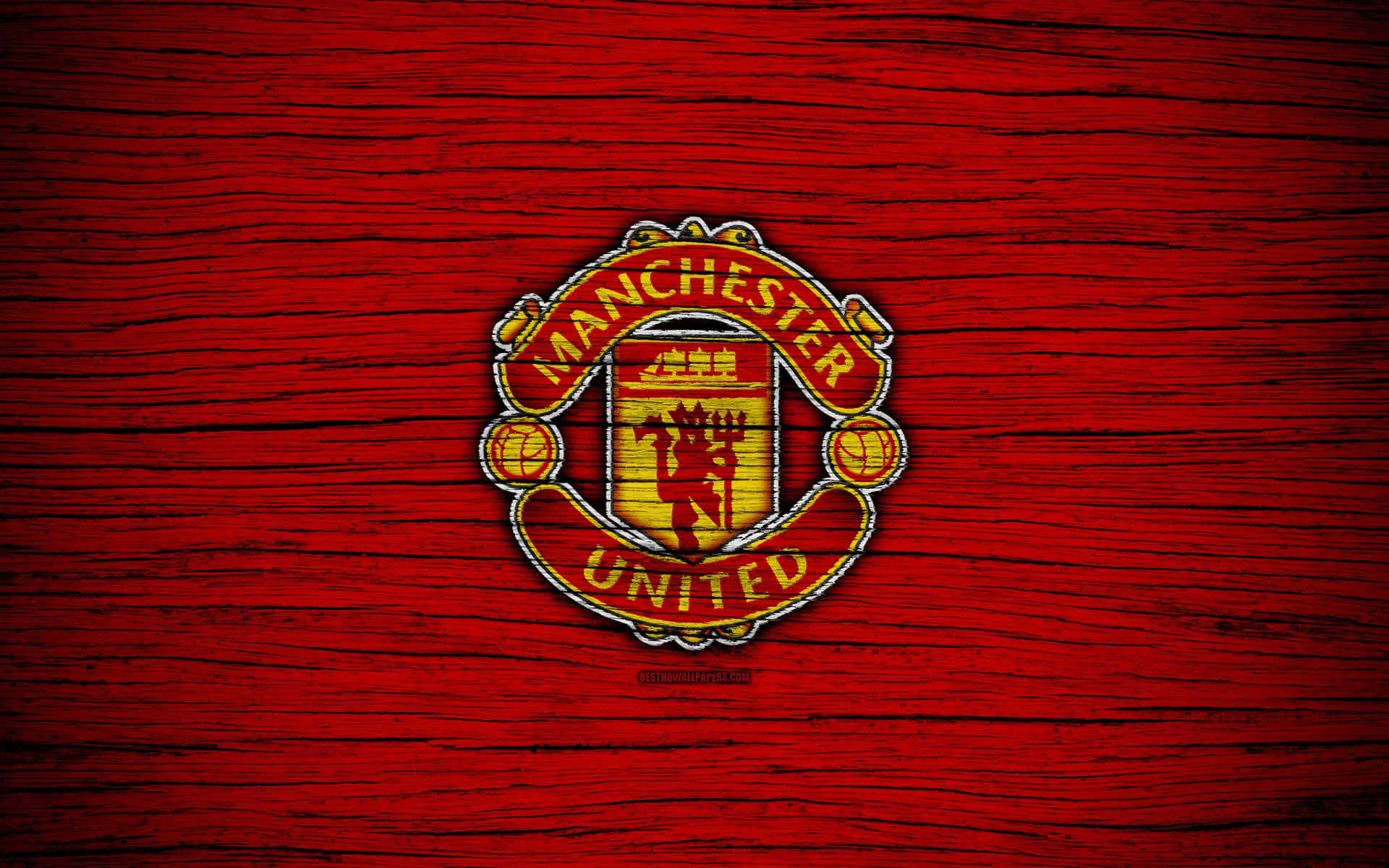 Equipodel Manchester United Y Fondo De Madera Fondo de pantalla