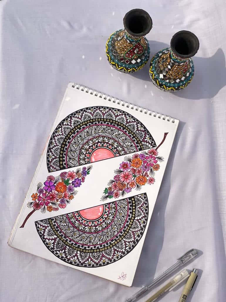 Einnotizbuch Mit Einem Blumenmuster Und Einem Stift