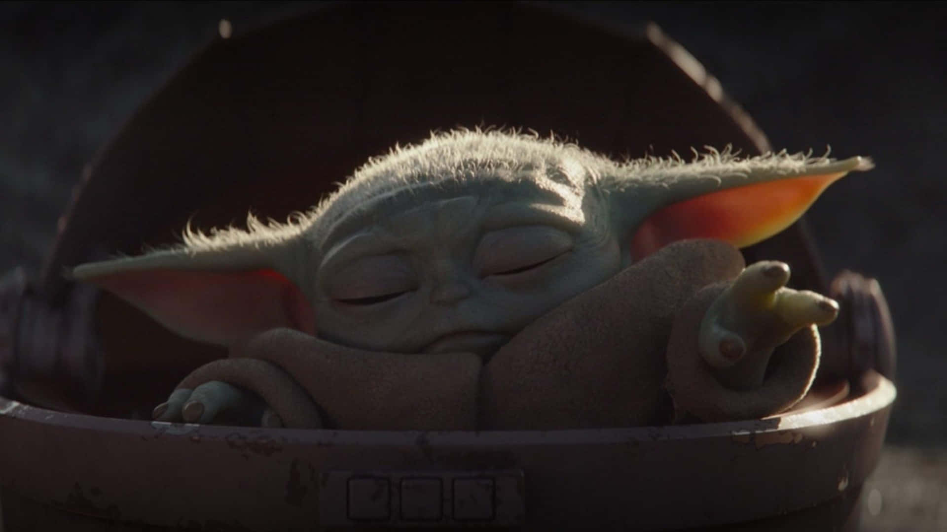 The Child, or “Baby Yoda”, from the popular TV show “The Mandalorian” Wallpaper