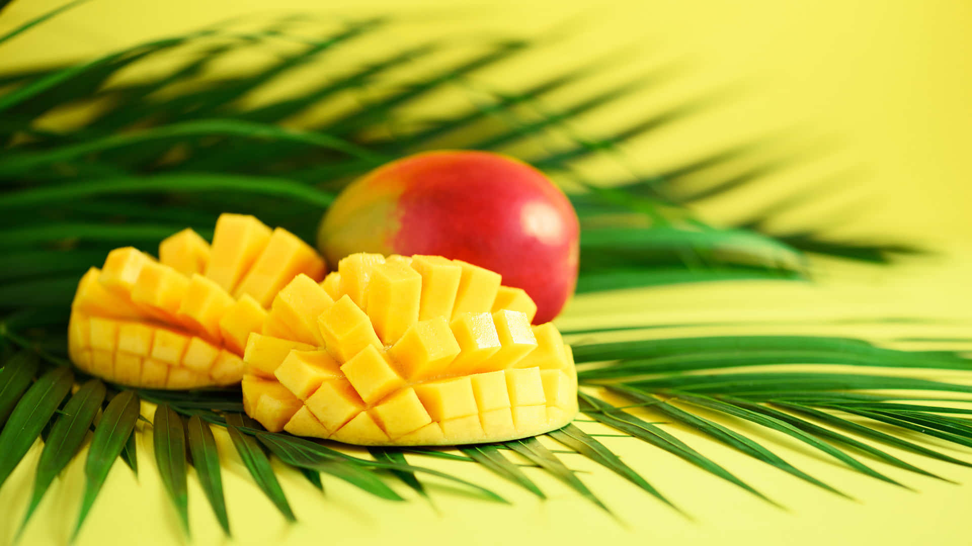 Mangoes And A Pineapple On A Yellow Background
