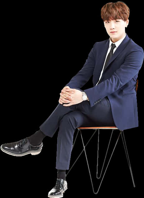 Manin Blue Suit Seated PNG