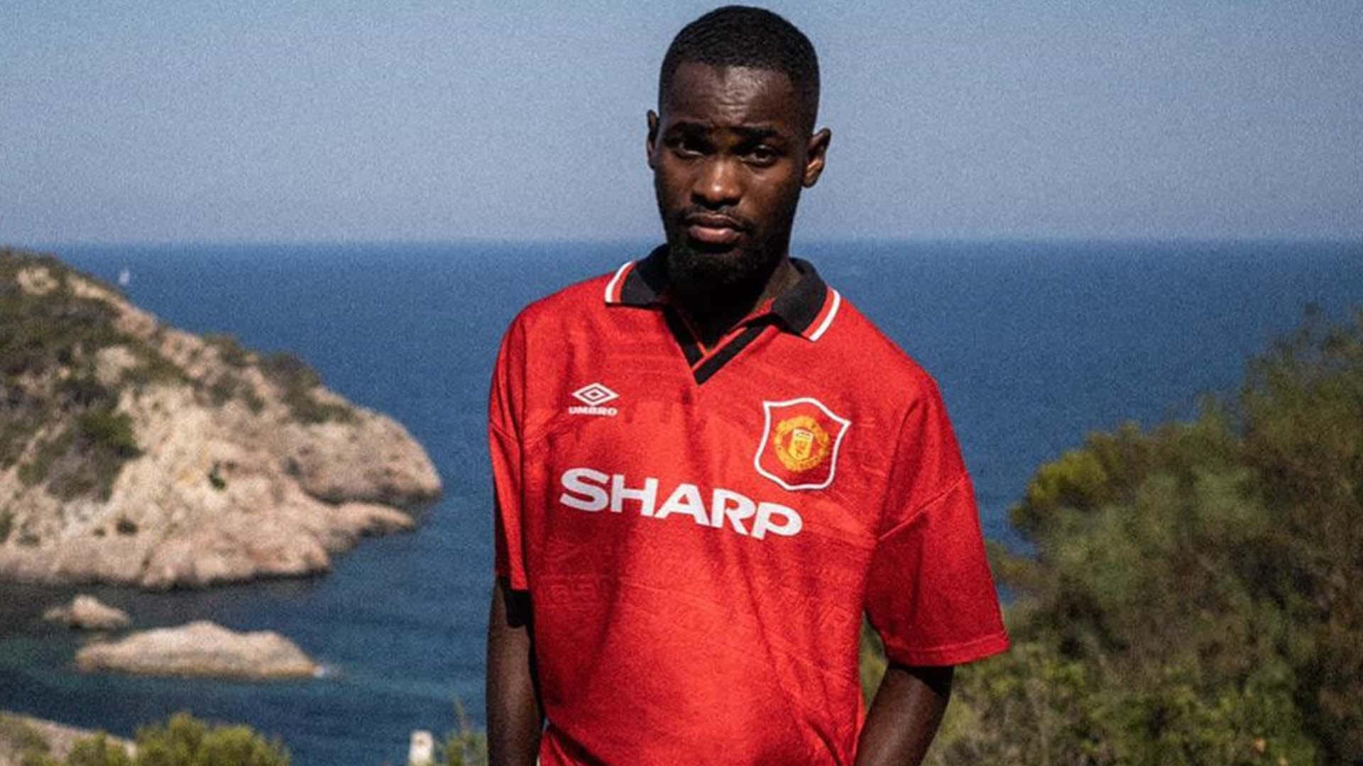 Man In Rode Manchester United Shirt Achtergrond