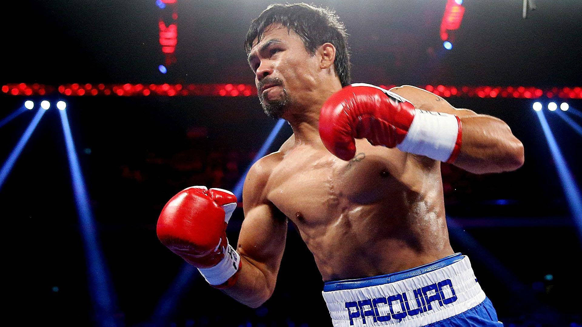 Manny Pacquiao Going For The Attack Wallpaper
