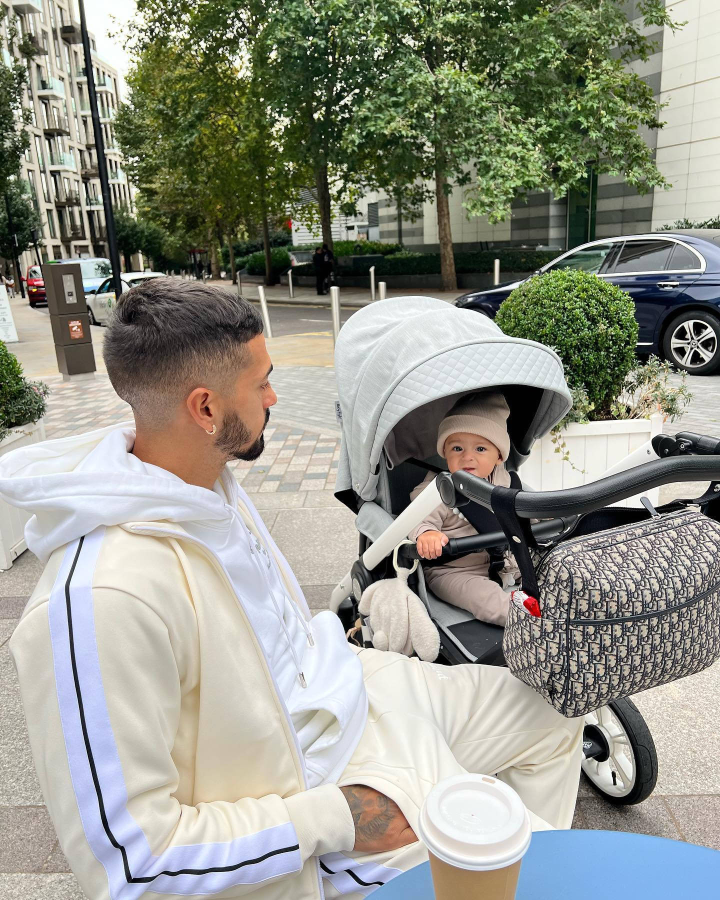 Manuel Lanzini And Baby In Stroller Wallpaper